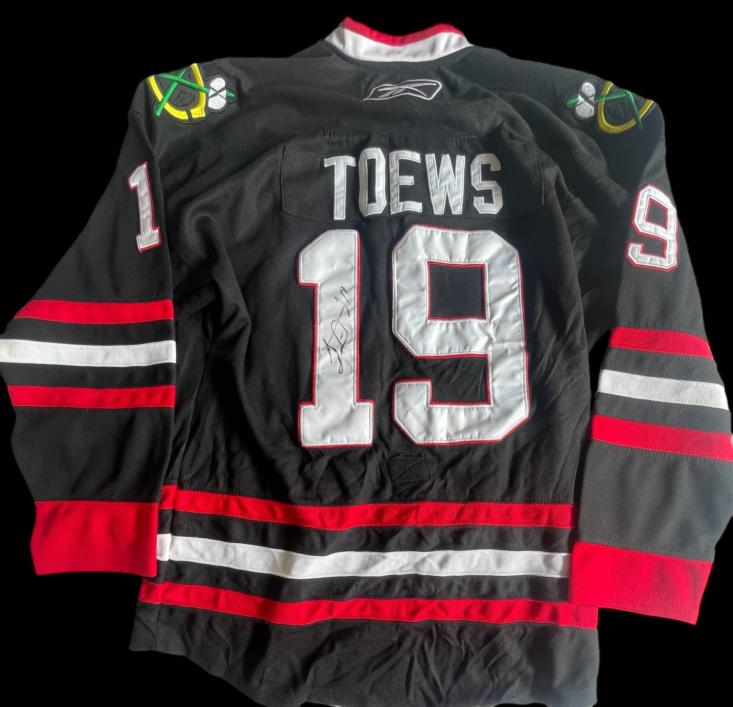 Johnathan Toews Autographed Jersey