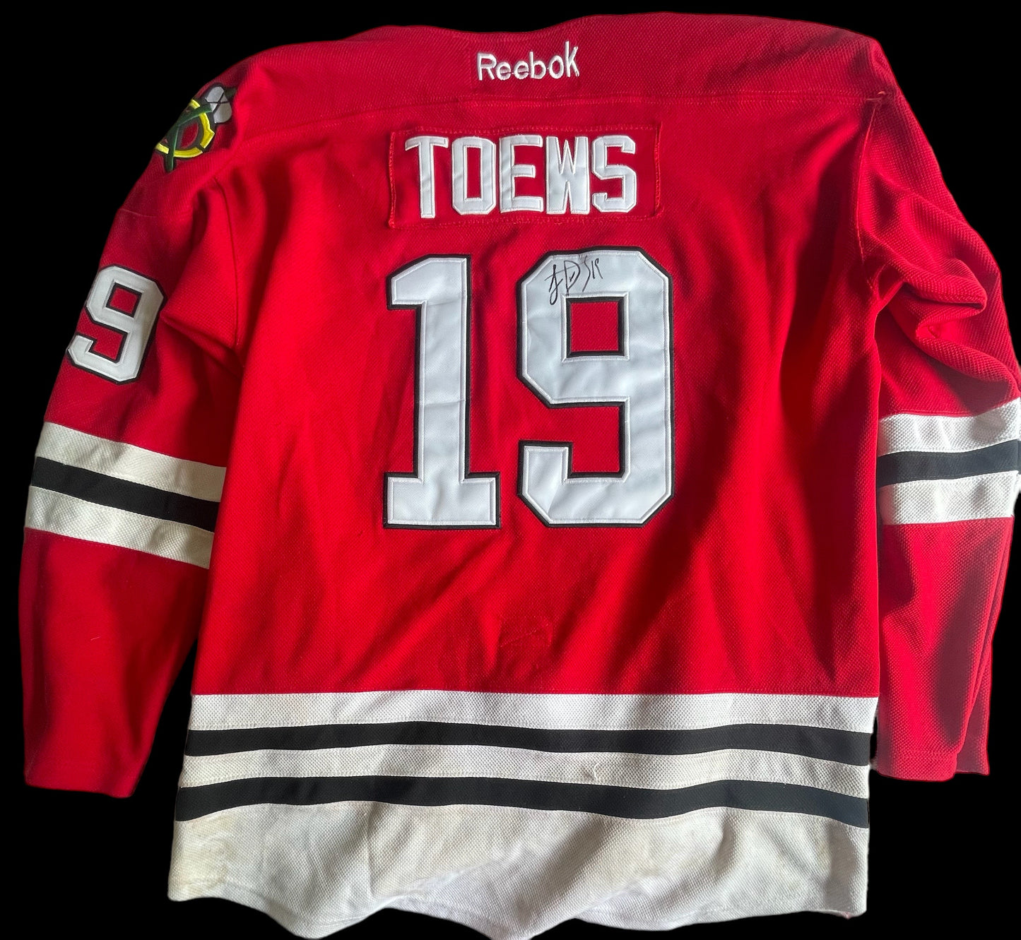 Johnathan Toews Autographed Jersey