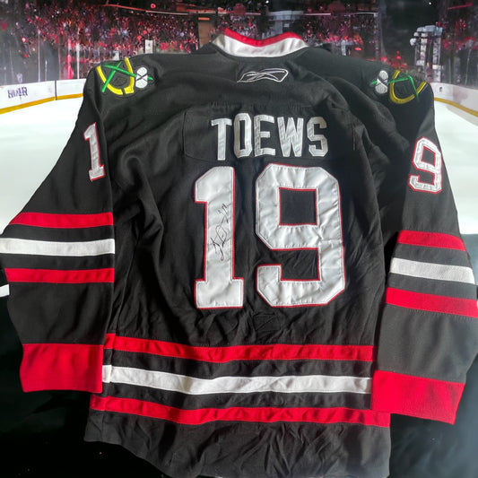 Johnathan Toews Autographed Jersey